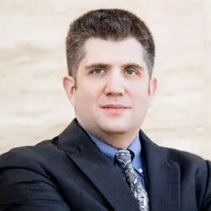 Bryan Joseph Fagan, child custody attorney in Houston, Texas, wearing a suit and tie, exemplifying professionalism and legal expertise in family law.